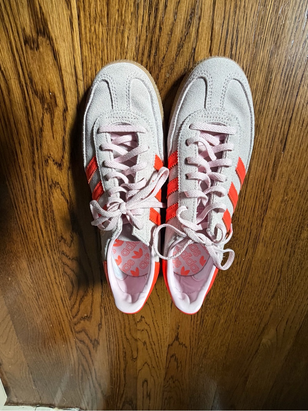 adidas Women's Light Pink Suede Sneakers with Bright Orange Stripes